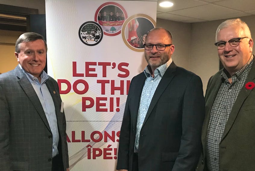 Co-chair Wayne Carew, from left, stands with newly appointed 2023 Canada Winter Games CEO Kyle Dudley and other co-chair Brian McFeely on Oct. 31. Photo submitted.