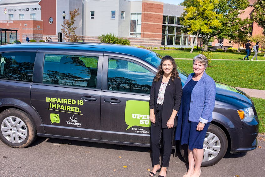 Keesha Ryan, UPEISU vice-president finance and administration, joins Darlene Compton, minister responsible for both the P.E.I. Liquor Control Commission and P.E.I. Cannabis Management Corporation, in launching Panther Patrol, a shuttle service for UPEI students.