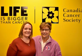 Jayna Stokes, left, and Noreen Murphy standing behind the front desk of the Canadian Cancer Society in Charlottetown on Monday, Sept. 30. Michael Robar/The Guardian