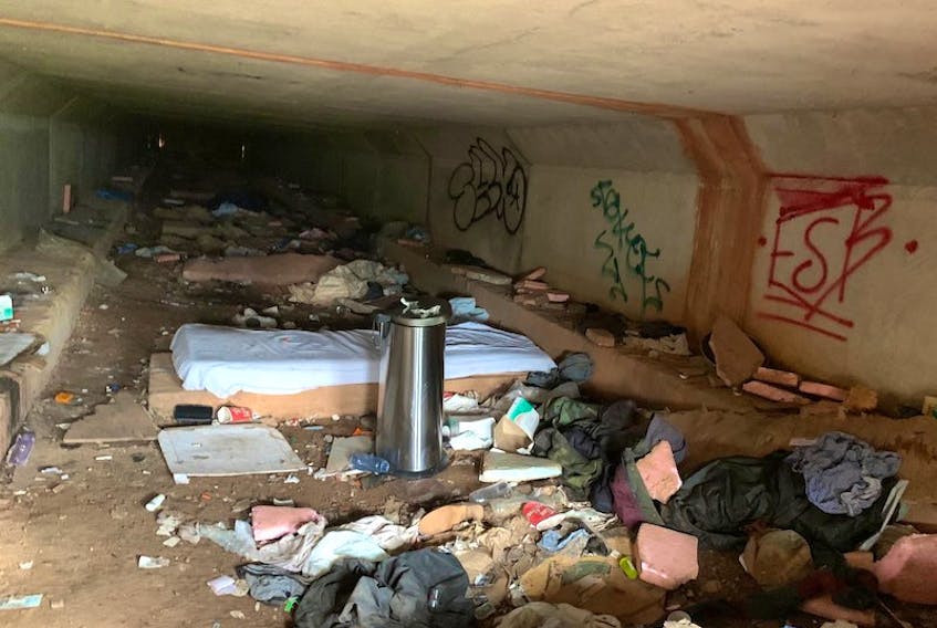 The interior of the "drug cave'' in Charlottetown is pictured here before the city's public works department cleaned out the cement tunnel and sealed off entrance into the site that was commonly used to consume and inject drugs.