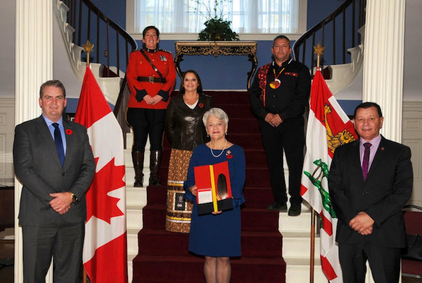 P.E.I. RCMP commanding officer Chief Supt. Jennifer Ebert, Chief Darlene Bernard, Lt.-Gov. Antoinette Perry, front, and Chief Junior Gould are shown at a ceremony at Fanningbank earlier this month. Also on hand for the ceremony but not shown in the picture are P.E.I. Justice Minister Bloyce Thompson and Senator Brian Francis.