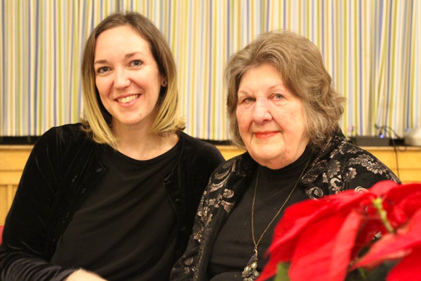 Kinley Dowling, left, was one of many Singing Strings alumni gathered to celebrate the 80th birthday of the orchestra's co-founder, Jenet Clement, at Park Royal United Church in Charlottetown on Jan. 4.