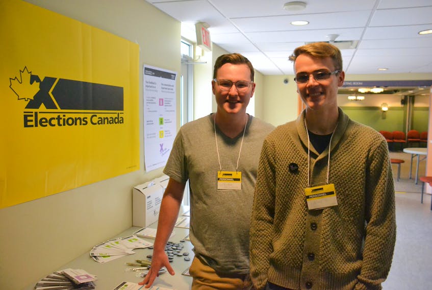 Will McGuigan (left) and Nick Costain help run the Elections Canada advanced polling stations at UPEI. Costain is a current student at the university, while McGuigan is a recent graduate.