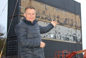 Bob Boyle, owner of the Brackley Drive-In Theatre, points to the railway containers stacked four stories high for a second movie screen at the long-running outdoor movie venue. Boyle expects movies to be playing on the second big screen by June.