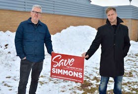 Mark Fisher, left, and Olin Penna, are members of a community group still trying to save Simmons Sport Centre from the wrecking ball in Charlottetown.