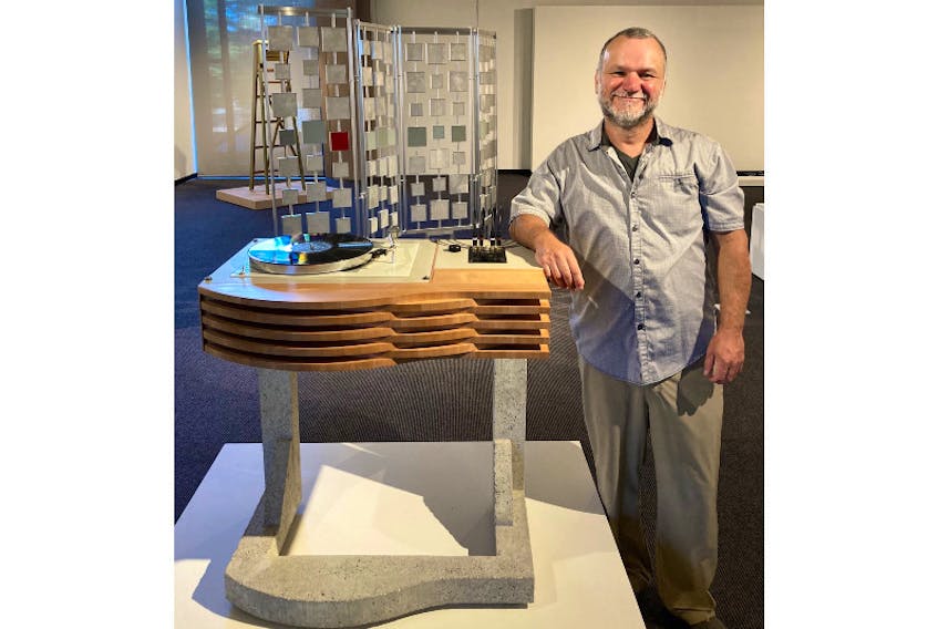 Island artist Jody Racicot is shown with his work, Record Player (2019, concrete, arbutus, maple, ebony, plywood, Formica, steel, electronics). The work is featured in the new exhibition, Creative Obsessions, which opens on Aug. 8 at Confederation Centre Art Gallery.