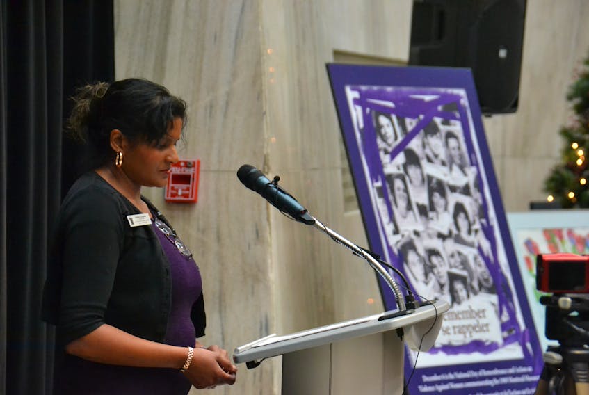 Deborah Langston, chair for the P.E.I. Advisory Council on the Status of Women, acted as emcee of an even commemorating the the 1989 murder of 14 women at École Polytechnique in Montreal. - Stu Neatby