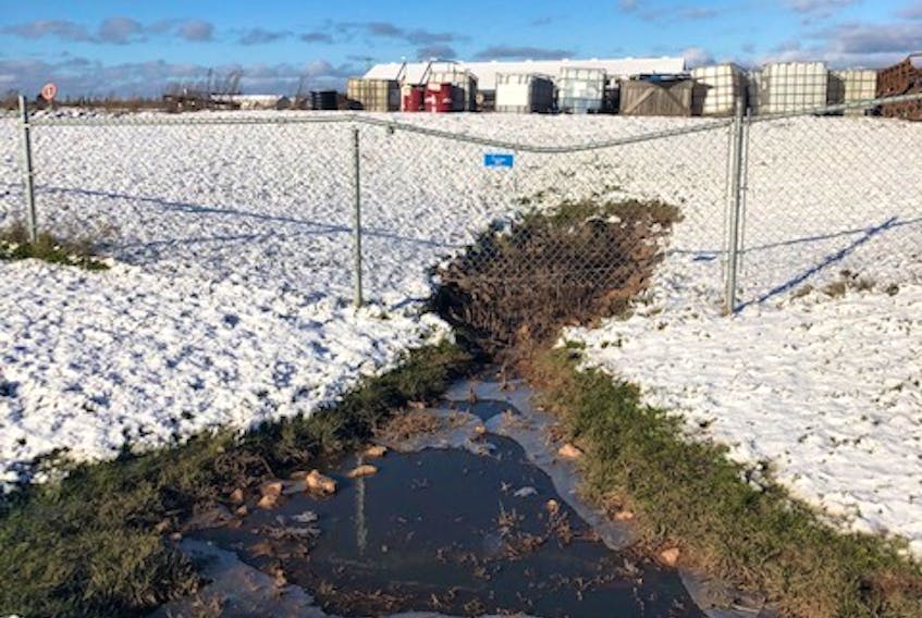 Wastewater leaves the RWL Holdings property via a culvert on Dec. 27 in this photo taken by Chris Wall.