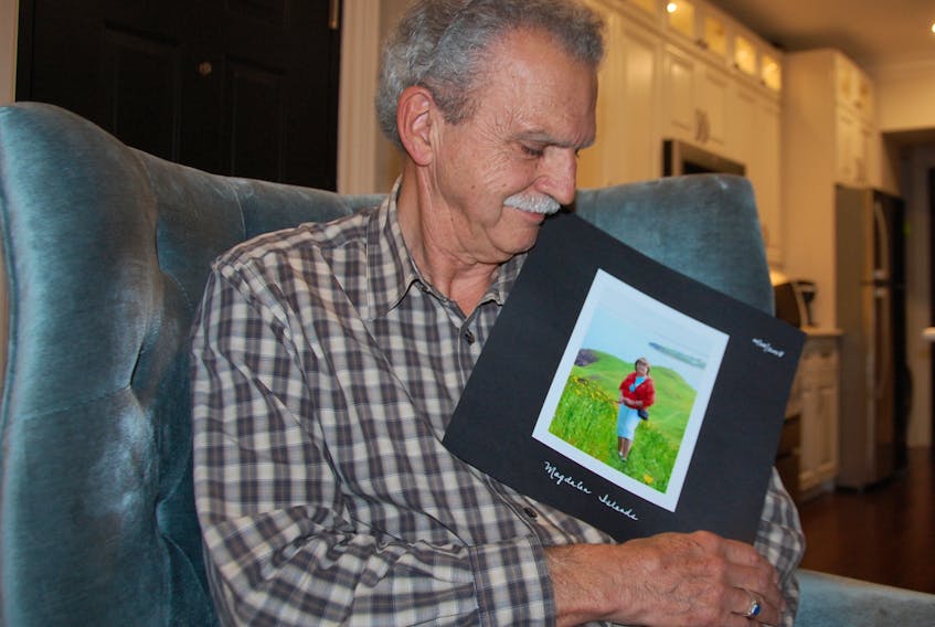 Roger Gallant of Panmure Island looks affectionately at a photo of his late wife Shirley, who died in June after a short battle with pancreatic cancer. Gallant is determined to be a vocal advocate in bringing more attention to the disease that is expected to claim the lives of 5,200 Canadians this year.
