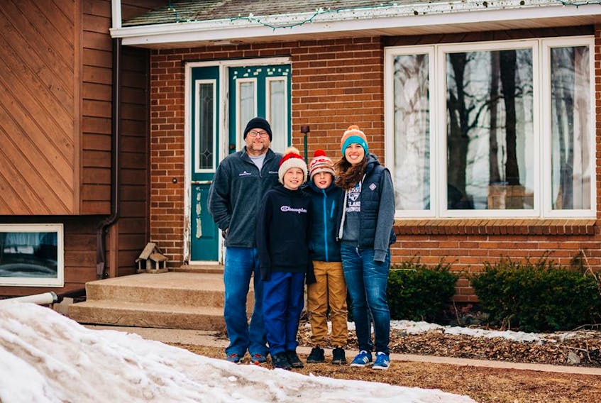 Derek and Jen Campbell with twins Ben and Jake took up the offer for a Front Step Project portrait by Kolby Perry on March 30.  - Kolby Perry/Special to The Guardian