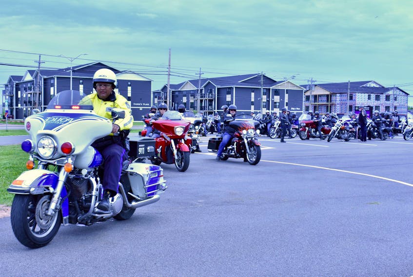 Charlottetown Police Services Const. Tim Keizer escorts the group of almost 100 motorcyclists out of the North River Fire Department parking lot Saturday morning. The group was gathered for the FU COVID Bikers Against Coronavirus Bike Rally to raise money for the Queen Elizabeth Hospital and show support and solidarity for frontline workers.