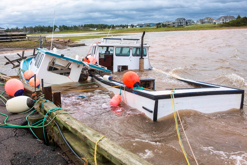 Fishing boats at Covehead wharf took a pummelling from Hurricane Dorian over the weekend. - Photo by Brian McInnis
