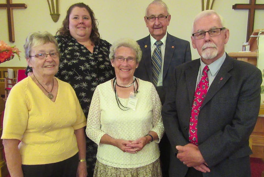 Tellers for the event, which runs 2-4 p.m. at the church in Cornwall, are historians Garth MacPhee, front right, and Lawson Drake, back right, here pictured with anniversary committee members Edith Scott, front left, Gloria Fullerton, front centre and Julie Mills as they prepare to share tales from bygone days certain to both inform and entertain. Fellowship with light snacks and tea will follow in the church hall.