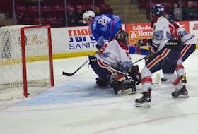 Forward and team captain Josh MacDonald scores the winning goal in the first minute of overtime to lift the Summerside D. Alex MacDonald Ford Western Capitals to a 5-4 victory over the Valley Wildcats Saturday night at Eastlink Arena.