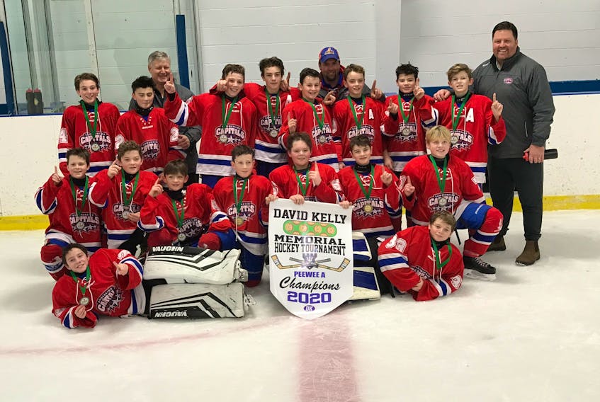 The Summerside Capitals’ peewee AA team won the Peewee A Division of the David Kelly Memorial hockey tournament last weekend in Saint John, N.B. Summerside, which combined strong passing, skating and work ethic, completed tournament play 5-0-1 (won-lost-tied). Members of the Capitals are, front row, from left: Deacon Maddix and Noah McNeill. Second row: Evan Beamish, Tucker MacDonald, Noah Lynch, Casey Johnson, Zack McNeill, Seamus Ramsay and Harrison Ramsay. Third row: Christian Cameron, Hudson Gallant, Nate Drummond, Tyson Wedge, Cameron Ellsworth, Evan MacFarlane, Lincoln Dyer and Kalen Bernard. Back row: Peter Bernard (coach), Johnny McNeill (coach) and Scott Drummond (coach).