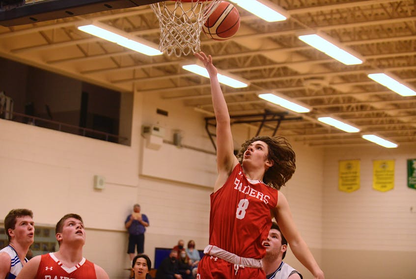 Willis Bulger of the Charlottetown Rural Raiders Team One goes in for a layup Monday against the Bluefield Bobcats Team One in Prince Edward Island School Athletic Association senior boys’ basketball action.