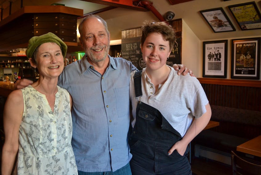 Jon Rehder, centre, meets with two of the P.E.I. performing artists who will be joining him at the Friday night musical series at Barnone Brewery in Rose Valley. From left are Bonnie LeClair, who will perform July 19 and Russel Louder, who will perform tonight.