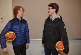 Seniors Jack Somers, left, and Ben MacDougall discuss the 26th annual Three Oaks Senior High School Christmas Classic basketball tournament this week. Somers and MacDougall, forwards with the Three Oaks No. 1 boys’ team, will be playing in their final Christmas Classic.