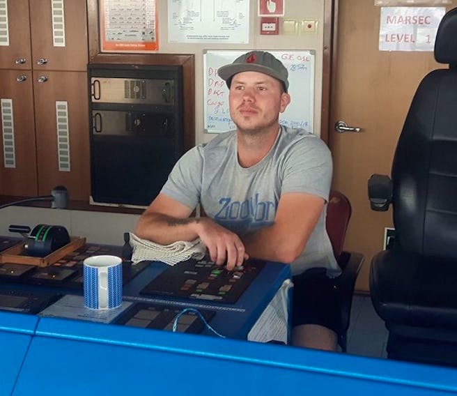 Ryan Mahar is seen in a 2018 photo taken while he was working on a large carrier ship. Mahar was seriously injured last week in a construction accident.