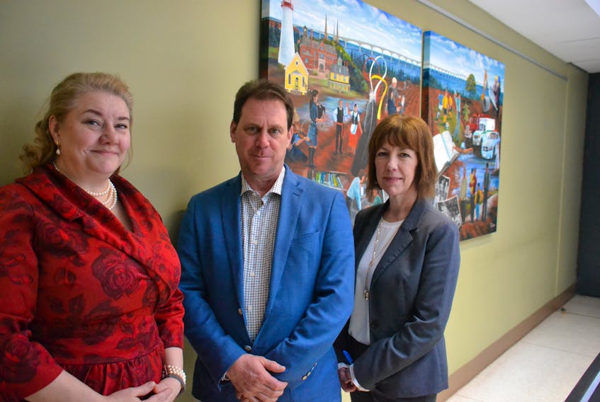 Heather Keizer, left, chief of mental health and addictions services, James Aylward, minister of health and wellness, and Verna Ryan, chief administrative officer for mental health and addictions, are shown outside the offices of the Department of Health and Wellness.