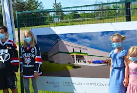 Tyne Valley minor hockey players, from left, Reece Grigg and Drew Kelly joined Tyne Valley figure skaters Sarah Enman and Emily Enman at an event Monday morning unveiling plans for a new Tyne Valley Events Centre.