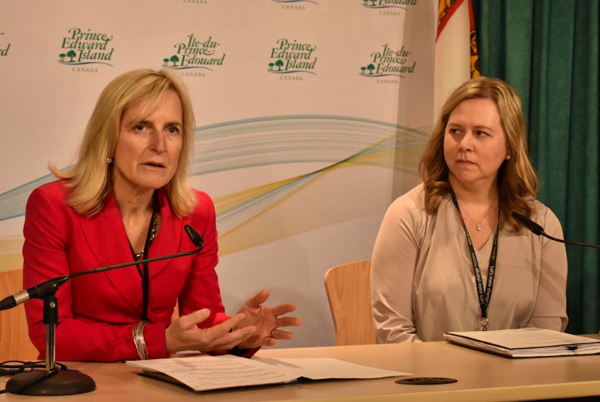 Dr. Heather Morrison, chief public health officer for P.E.I., left, and Marion Dowling, Health P.E.I’s chief of nursing, allied health and patient experience, announce closing of nursing and long-term care facilities to visitors on Sunday. Michael Robar/The Guardian