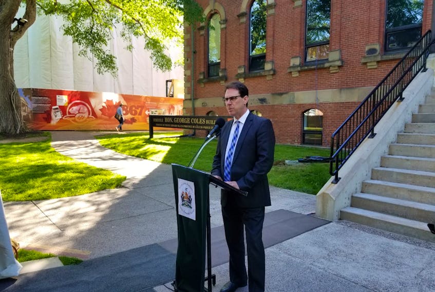 Health Minister James Aylward speaks to media following legislative session on Tuesday, June 16. Aylward was questioned in the legislature about $2.3 million allocated to a compensation package for doctors impacted by public health measures imposed by the Chief Public Health Office.