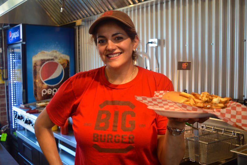 Rita Jreije, co-owner of Big Burger, said she can’t think of a better way of celebrating 25 years in business this week then to open a second location in the new Founders’ Food Hall and Market, which opened to the public on Friday. Dave Stewart/The Guardian