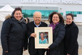 George Bassett, pictured outside the Queen Elizabeth Hospital in Charlottetown with his three of his daughters, from left, Mary, Georgina and Sarah Bassett, celebrate the establishment of the George and Abla Bassett Endowment at the Queen Elizabeth Hospital Foundation. The donation was made in memory of George’s wife, Abla, who died in 2015. The income earned from the endowment will go towards cancer care.