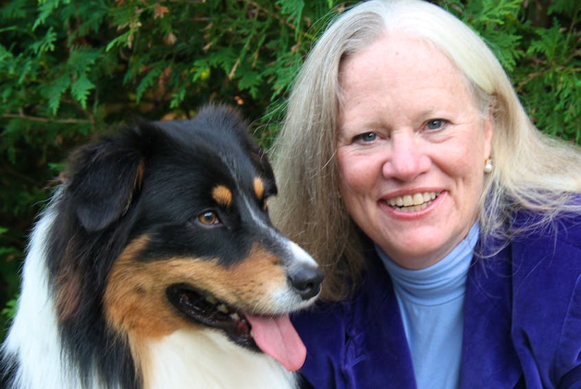 Dr. Karen Overall, associate professor of behaviour medicine, Atlantic Veterinary College, is shown with her dog, Hamilton.