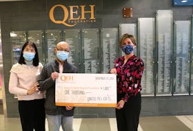 Gary Wong and Jess Leung of Uneed PEI Gifts present a cheque for $1,000 to Tracey Comeau, QEH Foundation CEO. This gift will support the QEH Foundation's Friends for Life Campaign to fund the purchase of sight-saving surgical equipment needed in the QEH Ophthalmology Department.