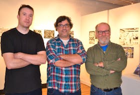 Robert Doan, left, Greg Webster and Sandy Carruthers are showing the artwork from their first graphic novel in a new exhibition at The Guild this month. Entitled Sandstone Comics: A 2019 Retrospective, the show runs until Jan. 21.