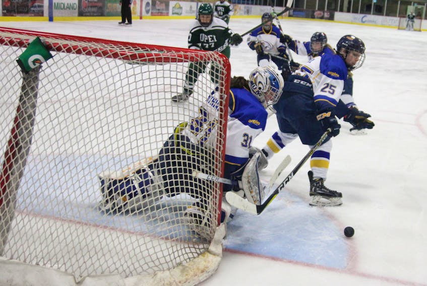 Université de Moncton Aigles Bleues goaltender Audrey Berthiaume keeps her eyes on a rebound during Sunday’s Game 2 of the Atlantic University Sport quarter-final with the UPEI Panthers in Moncton.
Normand A. Léger/Special to The Guardian