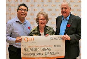 Dorothy Johnston, president of the QEH Auxiliary presents a cheque for $100,000, in support of the annual QEH Friends for Life campaign, to Dr. Larry Pan, left, QEH Radiation Oncologist and head of radiation oncology and Ed Lawlor, QEH Foundation chair Funds throughout this campaign will support the purchase of a new CT Simulator for radiation treatment planning in the P.E.I. Cancer Treatment Centre at the QEH, at a cost of $1.5 million.