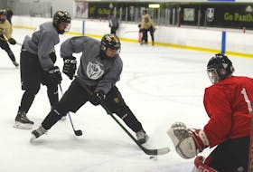 Caleb MacDonald prepares to take a shot during a drill Tuesday at the Charlottetown Bulk Carriers Knights practice at MacLauchlan Arena.