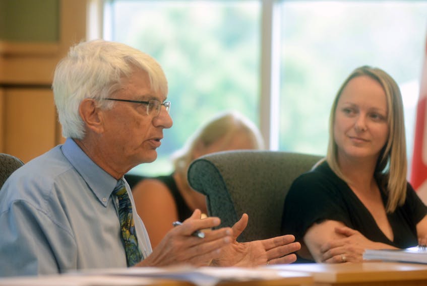Coun. Peter Meggs, left, speaks during Cornwall council’s monthly meeting on July 17, 2019. Next to him is Coun. Jill MacIsaac.
