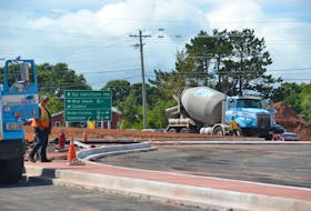 Construction workers are shown on the site of an under-construction roundabout at the corner of St. Peters Road near the perimeter highway. A three-year-old City of Charlottetown plan proposes the construction of three other roundabouts along St. Peters Rd.