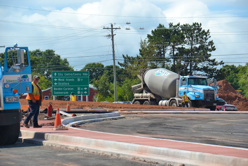 Construction workers are shown on the site of an under-construction roundabout at the corner of St. Peters Road near the perimeter highway. A three-year-old City of Charlottetown plan proposes the construction of three other roundabouts along St. Peters Rd.