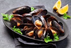 There are many ways to serve mussels, but one of the easiest is steamed with tomato sauce, parsley and lemon.