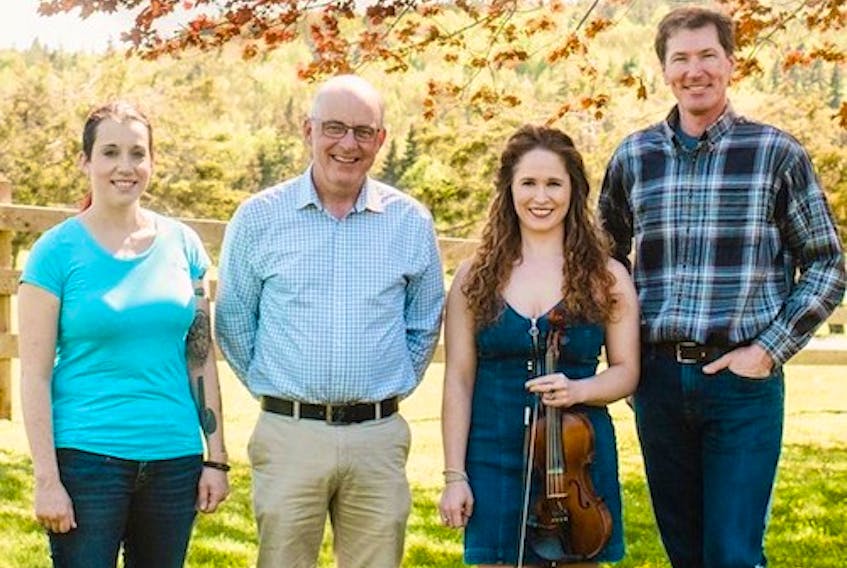 Fiddler’s Sons with Eddy Quinn, right John B. Webster, Keelin Wedge, left, and Courtney Hogan-Chandler will perform tonight at the Benevolent Irish Society.