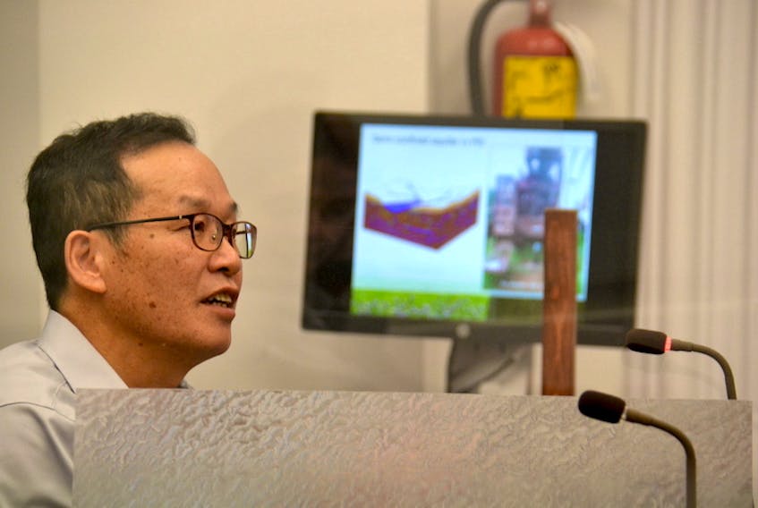 Hydrogeologist Yefang Jiang speaks before a recent standing committee meeting. Jiang has developed a model to predict the impacts on one P.E.I. watershed of expanded use of high capacity wells.