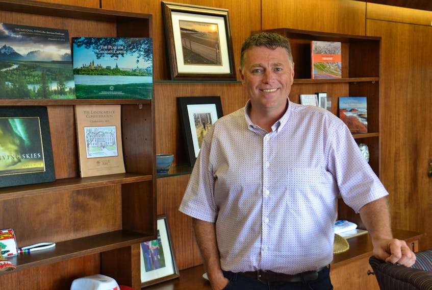 Dennis King poses for a photo in the premier’s office on Friday. The premier says his first 100 days as Premier has resulted in a dramatic change in the “style, tone and tenor” of government.