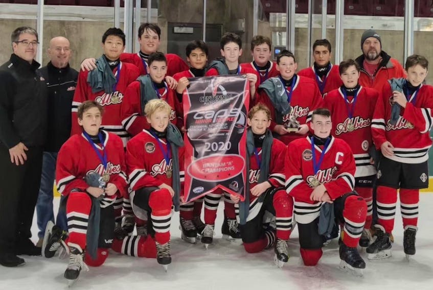 The Charlottetown Abbies captured one of two divisions at the recent 2020 Centennial Auto Group bantam A hockey tournament at Credit Union Place in Summerside recently. The Abbies edged the New Glasgow Bombers 3-2 in overtime to claim the championship banner. Members of the Abbies are, front row, from left: Ethan Alexander, Gram Hemphill, Kip Morris and Seth Fraser. Back row: Craig Cooper (assistant coach), Bobby Jay (head coach), David Kong, Nolan Cooper, Zach Zakem, Juan Cifuentes, Adam Jay, Braeden Tompkins, Cohen Munn, George Dow, Kyler Barrett, Dave Tompkins (assistant coach) and Cam Matheson. Missing from photo is Thomas Condon.