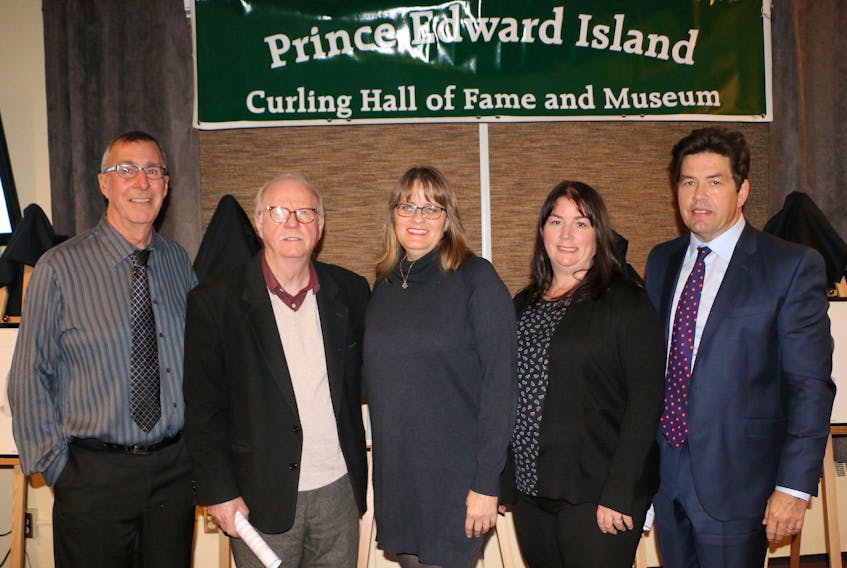 Five curlers were inducted into the Prince Edward Island Curling Hall of Fame and Museum Tuesday in Charlottetown. From left are John Likely, Wayne Matheson, Shelley Muzika, Leslie MacDougall and Mike Dillon.