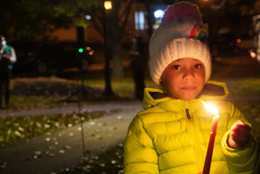 Arianna Eriavbe-Wolters, 5, was one of about a hundred people who attended an End SARS vigil in Charlottetown on Oct. 23.