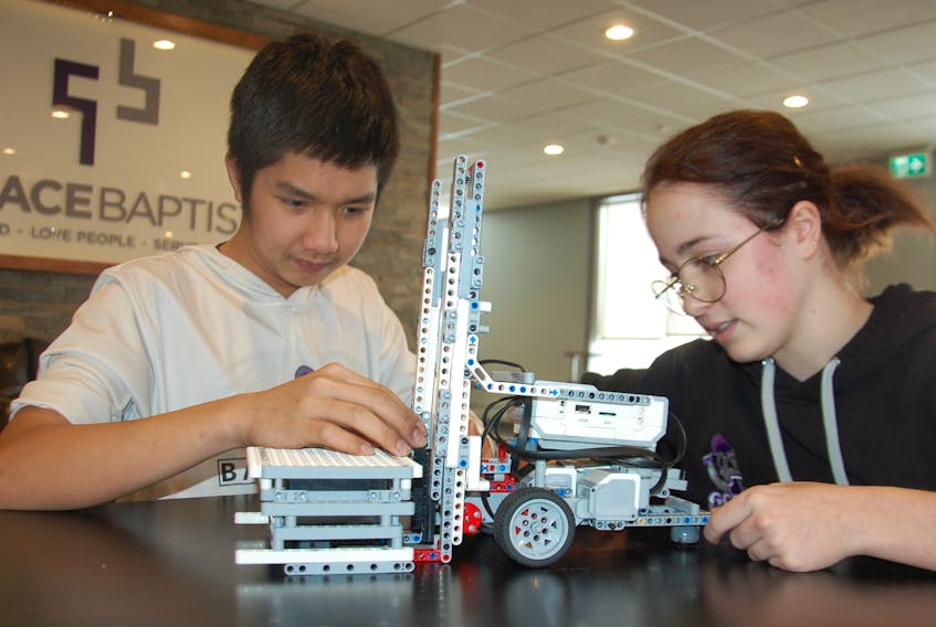 Lucas Nguyn, 14, and Danielle LeBlanc, 18, both did Grace Christian School proud on their respective junior and senior team at recent robotics competitions.