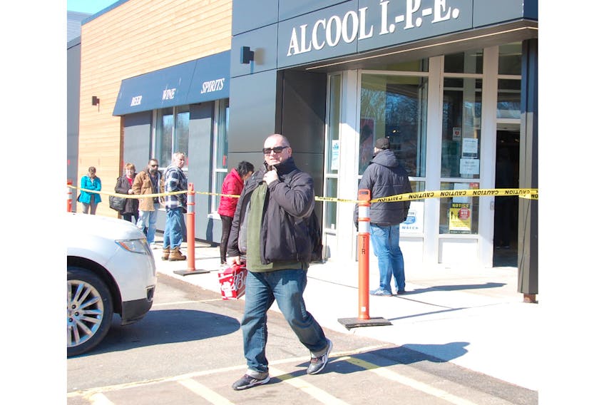 Customers were keeping a safe distance apart as they lined up to enter the Oak Tree Place liquor store in Charlottetown this morning. The store will operate from 11 a.m. to 6 p.m. Monday to Saturday with an opening of 10 to 11 a.m. Monday to Sunday for seniors and others vulnerable to coronavirus (COVID-19 strain). Transportation Minister Steven Myers has warned if shoppers do not maintain social distancing, government would re-evaluate whether to keep the store open.