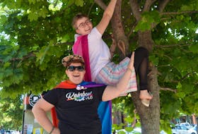 Rory Starkman, left, youth services co-ordinator with Peers Alliance, and Maddy Power-Lockman, community co-ordinator, say having some wacky fun is part of the plan for Pride Week activities, July 26-Aug. 2.