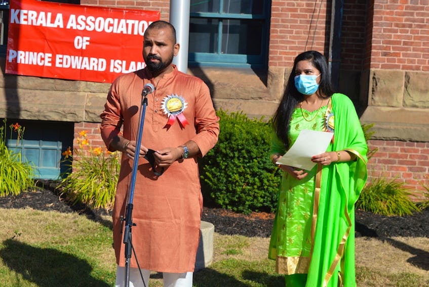 Jineesh Joshy, left, president of the Kerala Association of Prince Edward Island, joins vice-president Josily Joseph at a recent ceremony marking the 74th anniversary of India's Independence Day on Aug. 15.