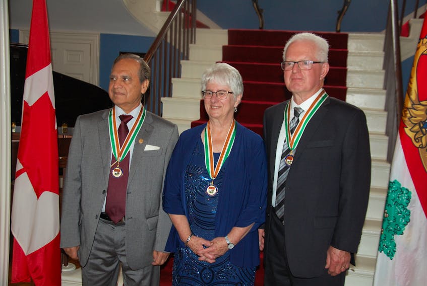 Islanders Najmul Chisti, left, Jeannette Arsenault and Leo Broderick were inducted into the Order of P.E.I. at a ceremony held at Government House on Sept. 25, 2019.